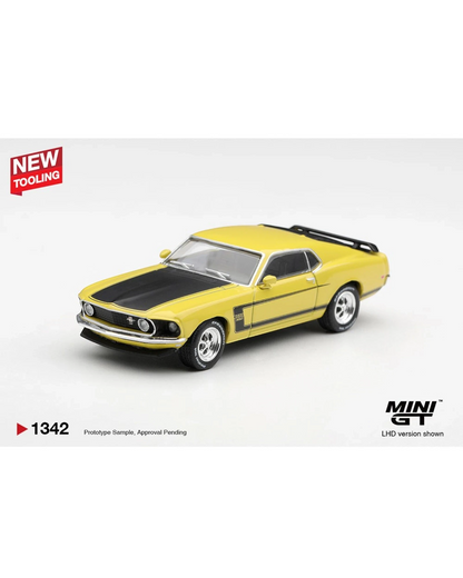 More Than Diecast 1:64 scale Mini GT 1969 Ford Mustang Boss 302 die-cast model car in bright yellow with black hood.