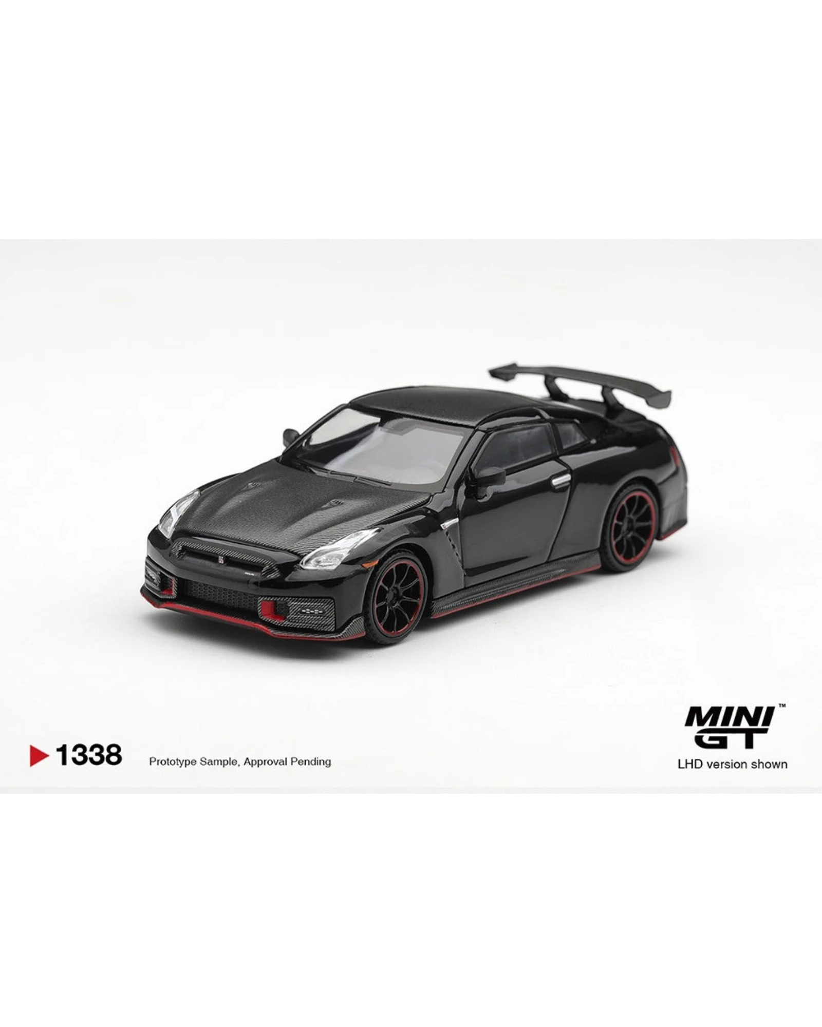 More Than Diecast 1:64 scale black Nissan GT-R Nismo 2024 die-cast model with red trim and rear wing