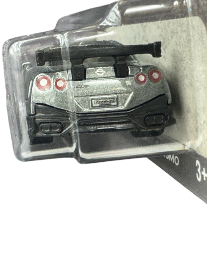 More Than Diecast 1:64 scale 2020 Nissan GT-R Nismo die-cast car in black, rear view showing spoiler and taillights.