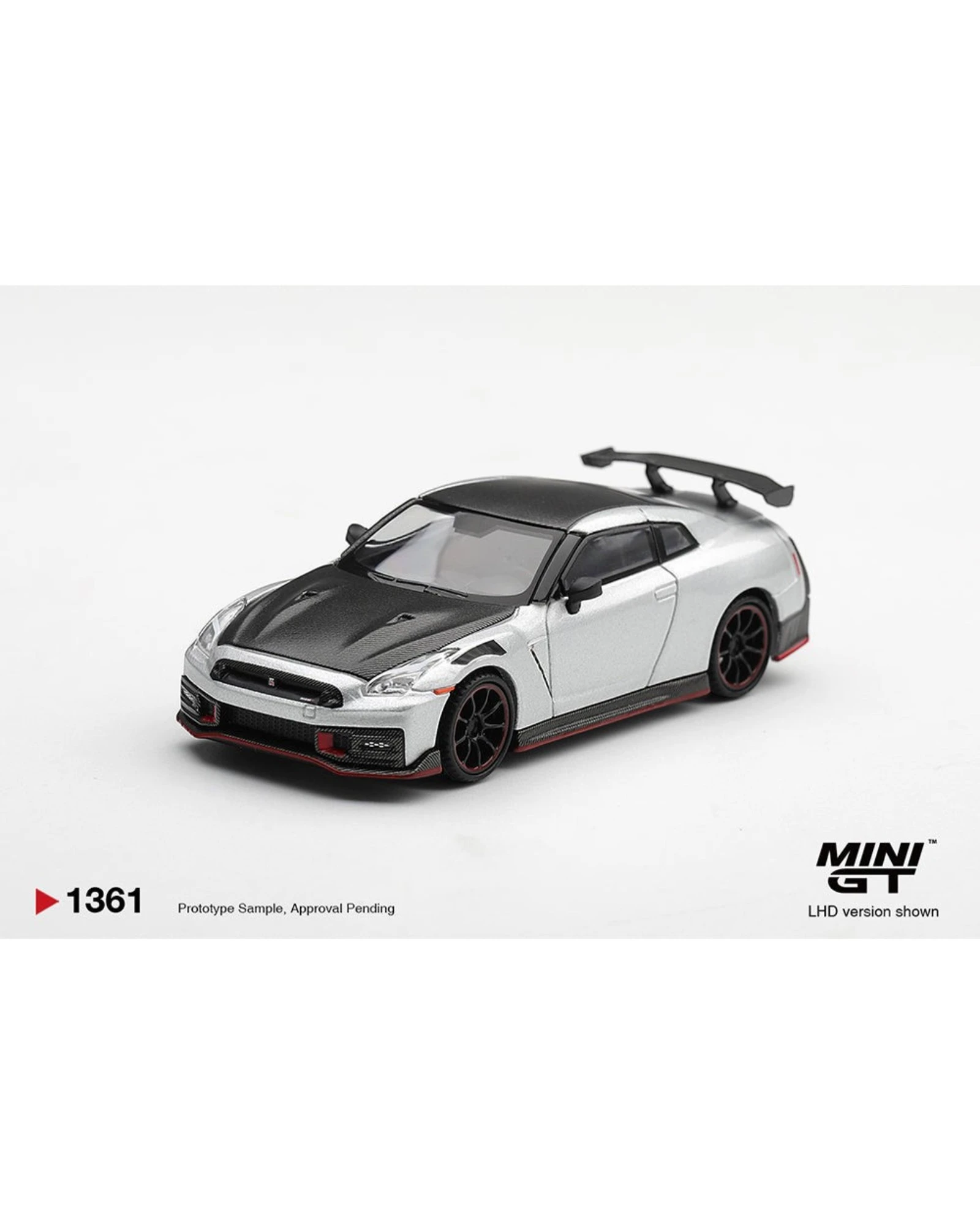 More Than Diecast 1:64 scale silver Nissan GT-R NISMO 2024 die-cast model car with black carbon fiber hood and spoiler.