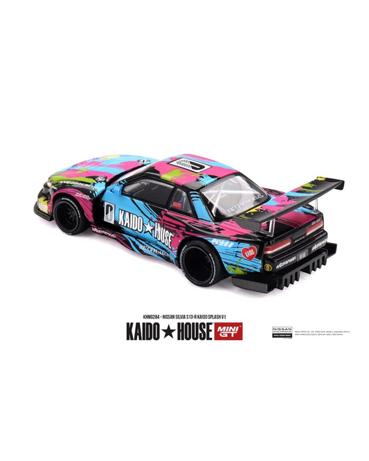 More Than Diecast 1:64 scale Nissan Silvia S13-R Kaido Splash V1 model car with vibrant pink, blue, and yellow graphics.