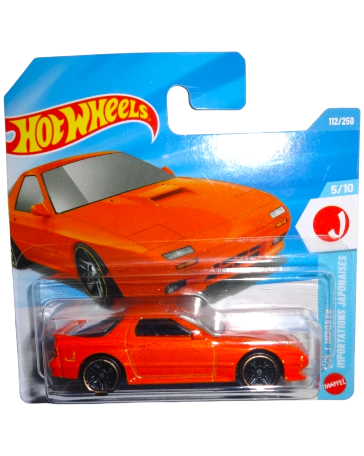 More Than Diecast: Orange 1989 Mazda Savanna RX-7 FC3S Hot Wheels toy car in packaging.