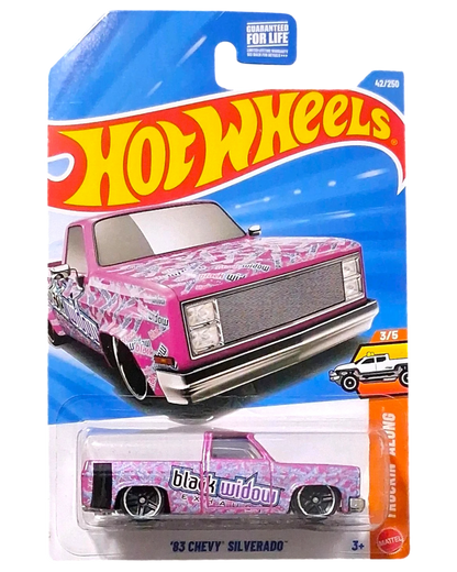 More Than Diecast Hot Wheels 83 Chevy Silverado Black Widow pink die-cast truck in original blister card packaging