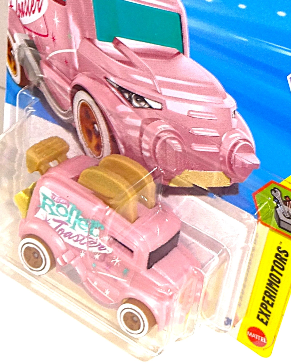 More Than Diecast Hot Wheels 2026 Roller Toaster die-cast car in pink with toaster-themed design and white wheels.