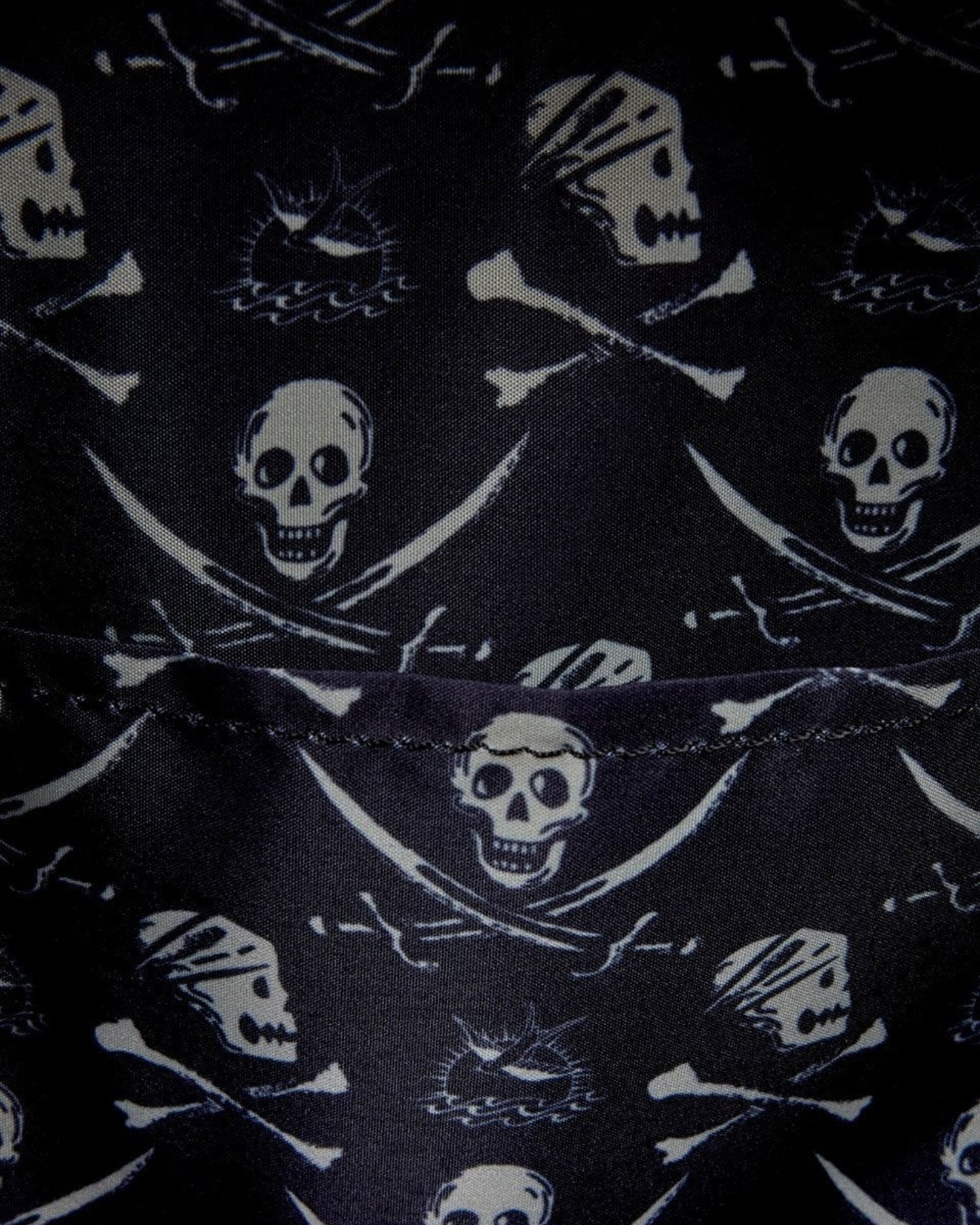 More Than Diecast Pirates of the Caribbean Jack Sparrow cosplay mini-backpack with skull and crossbones pattern.
