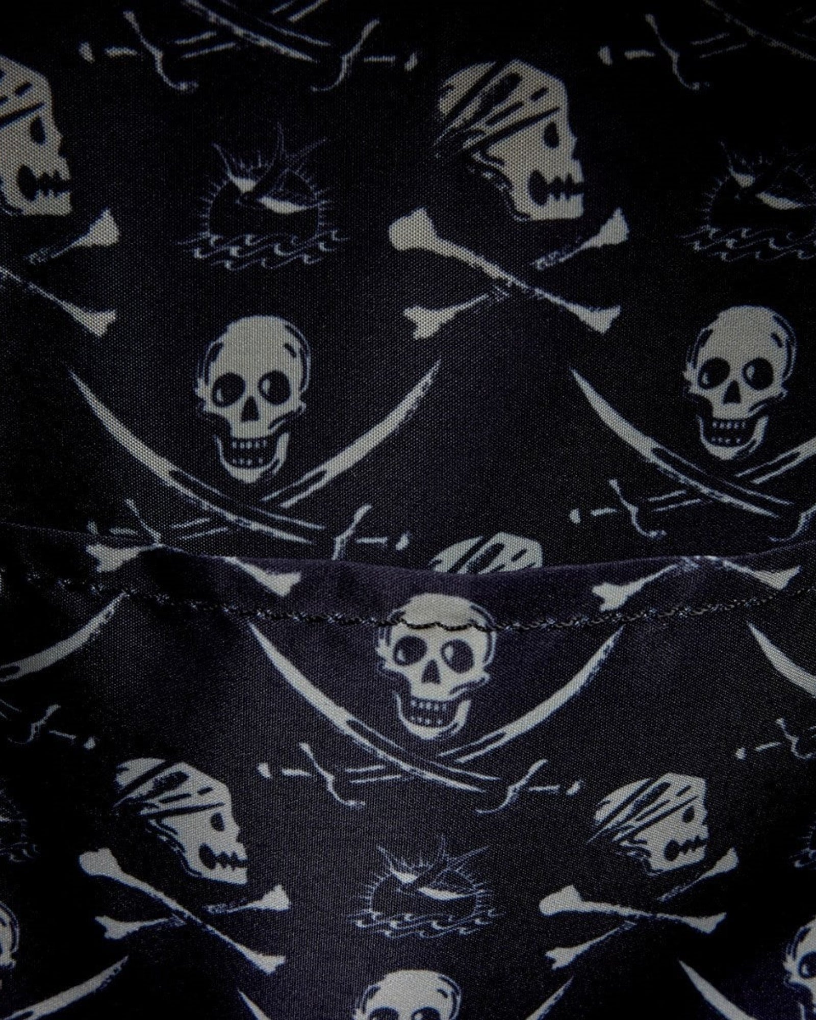 More Than Diecast Pirates of the Caribbean Jack Sparrow cosplay mini-backpack with skull and crossbones pattern.