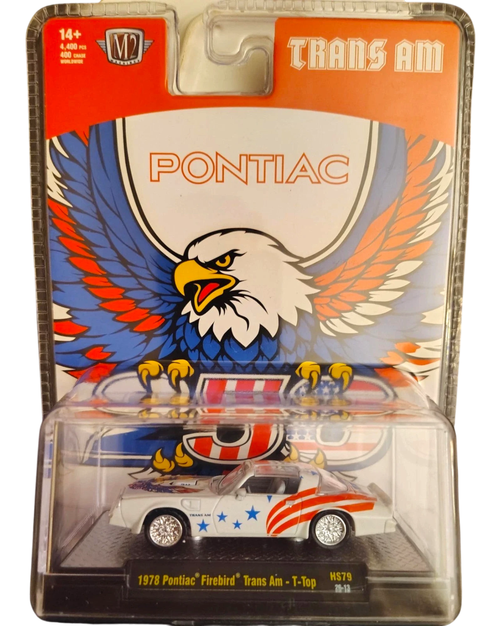 More Than Diecast 1:64 scale M2 Machines Pontiac Trans Am T-Top die-cast car in white with patriotic eagle graphics.
