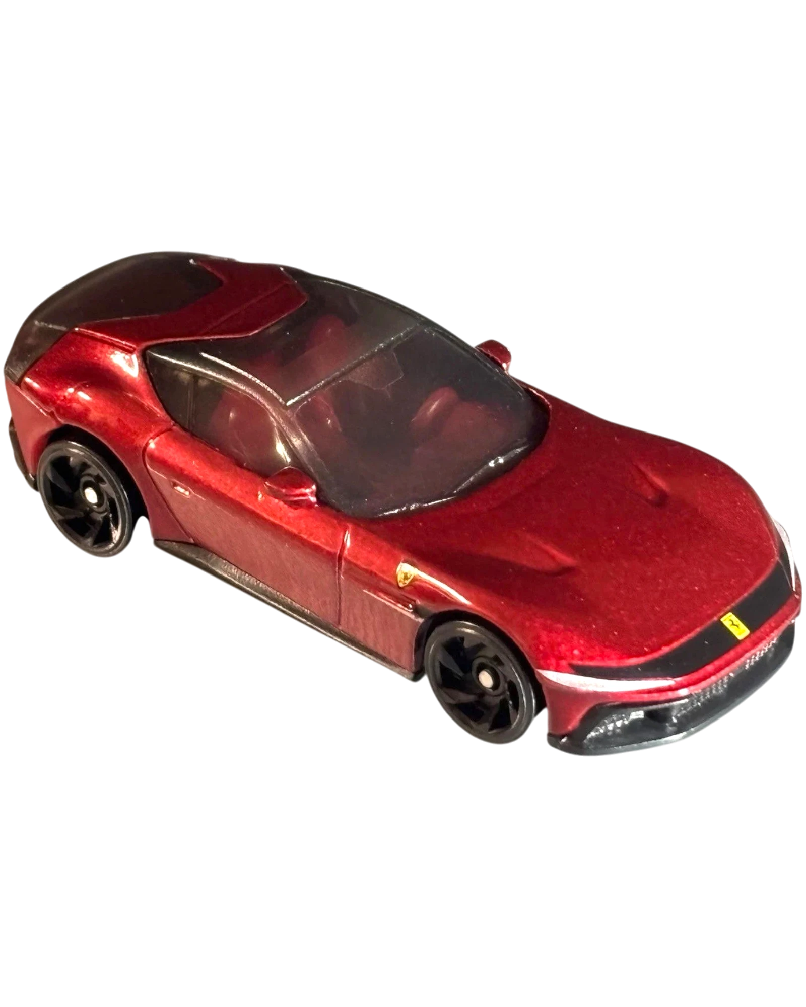 More Than Diecast red Ferrari 12 Cilindri 1:64 scale die-cast toy car with sleek modern grand tourer design