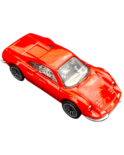 More Than Diecast Hot Wheels Ferrari Dino 206 GT in bright red, a 1:64 scale die-cast classic Italian sports car.
