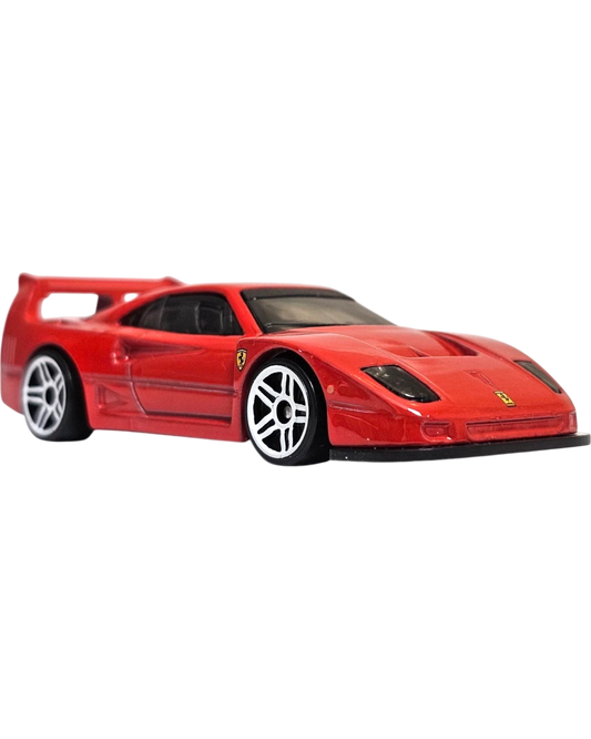 More Than Diecast red Hot Wheels Ferrari F40 Competizione 1:64 scale die-cast car with white five-spoke wheels