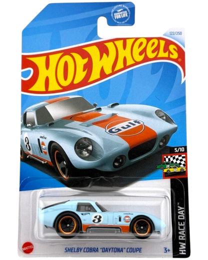 More Than Diecast Hot Wheels Shelby Cobra Daytona Coupe in Gulf Oil light blue and orange livery on blister card