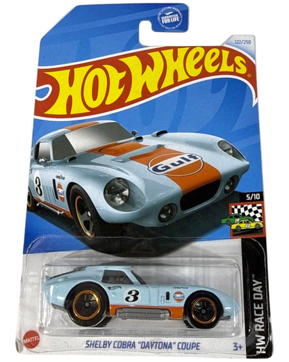 More Than Diecast Hot Wheels Shelby Cobra Daytona Coupe in Gulf Oil blue and orange livery on a creased card