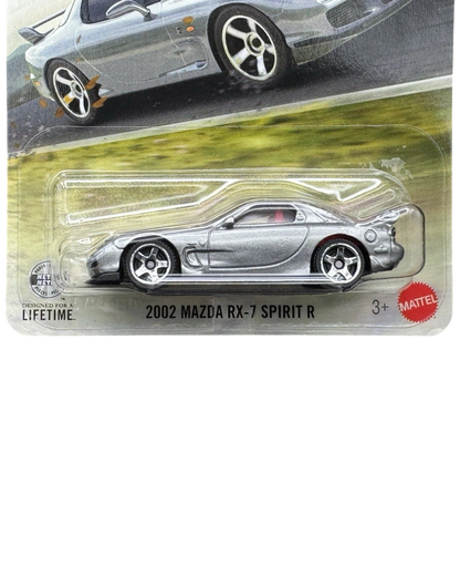 More Than Diecast silver 2002 Mazda RX-7 Spirit R 1:64 scale die-cast car in original blister packaging