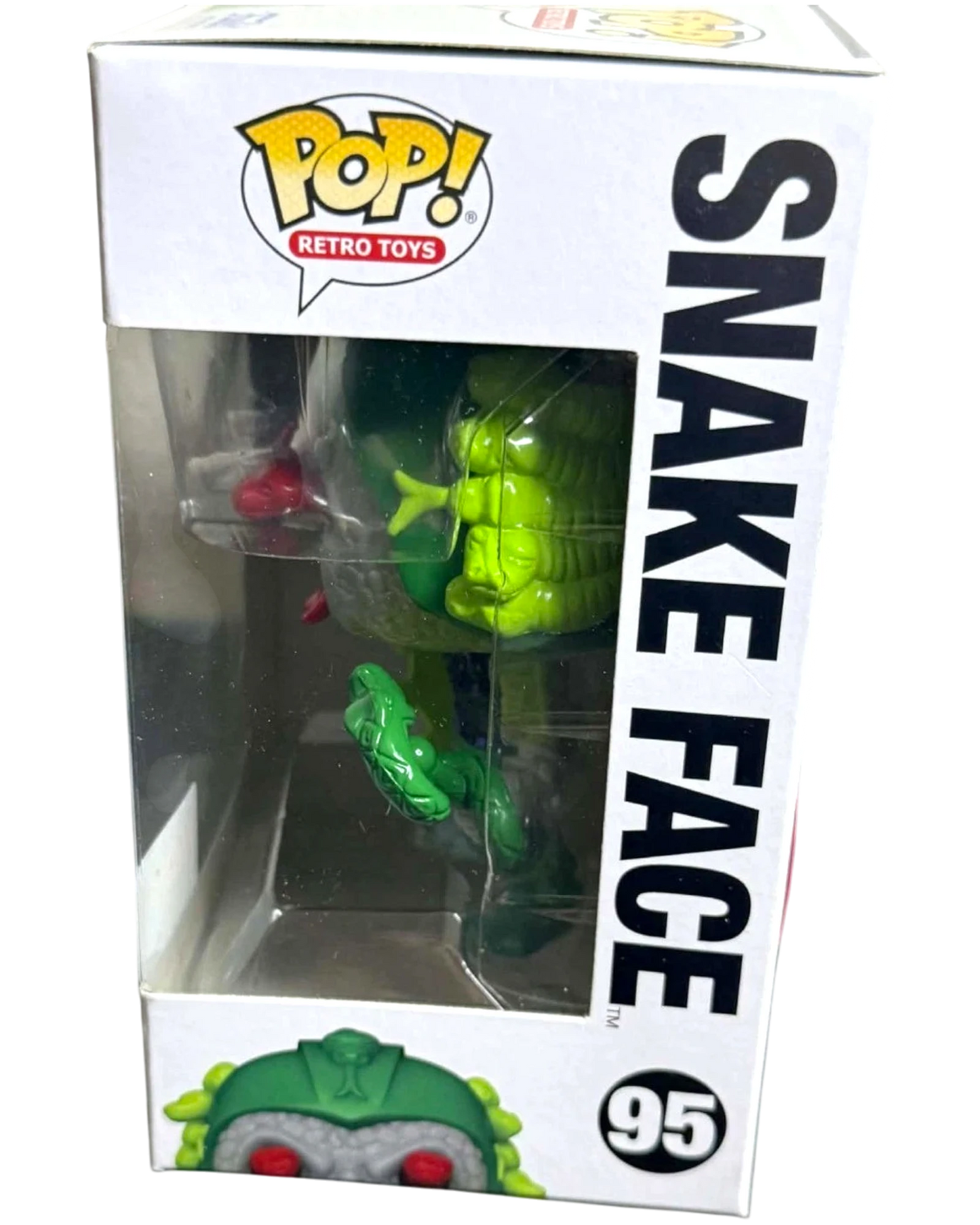 More Than Diecast Masters of the Universe Snake Face 95 Funko Pop figure in box. Green, red, and yellow.