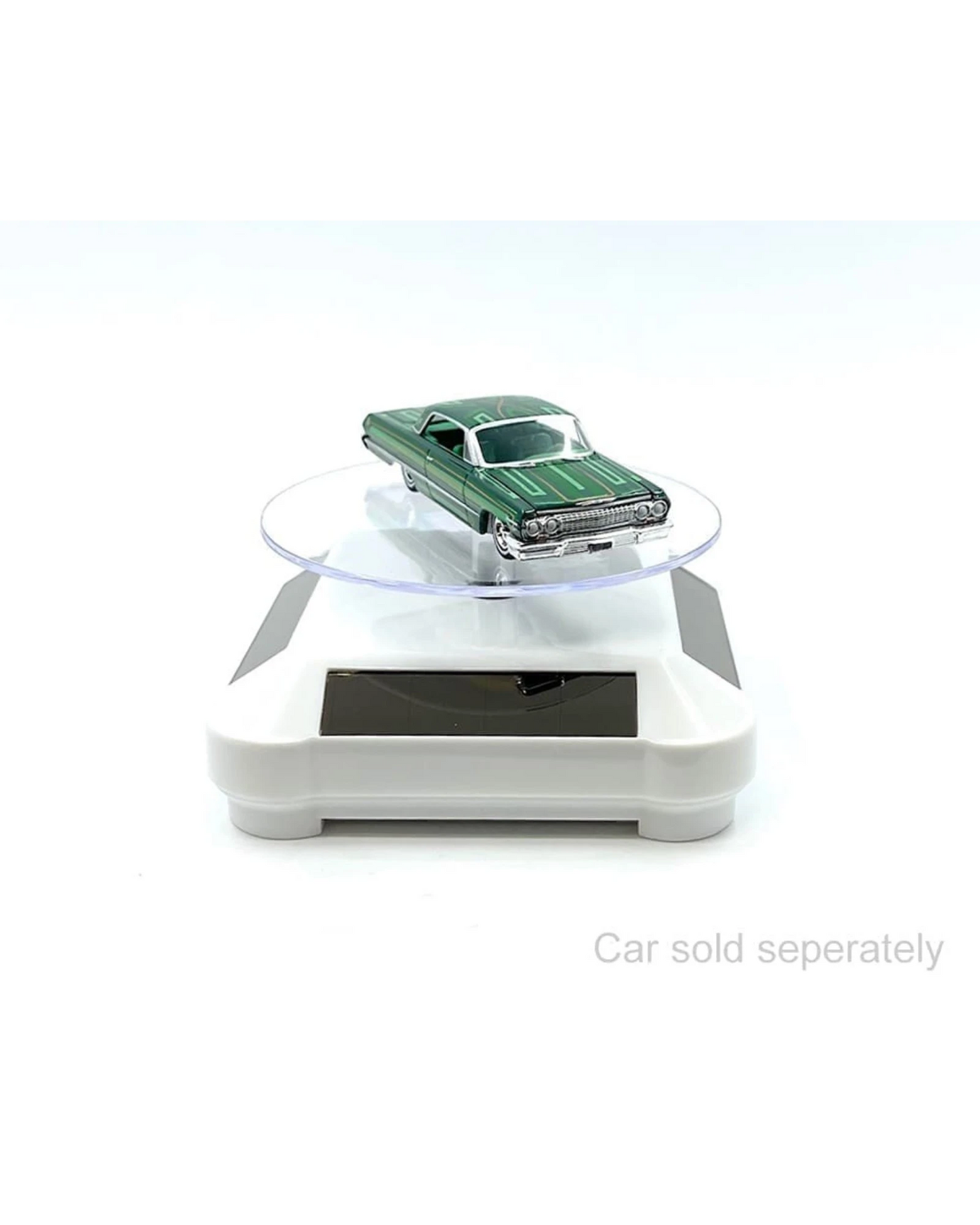 More Than Diecast white solar powered 3.5" turntable display stand with 360 rotation, showcasing a green die-cast car.