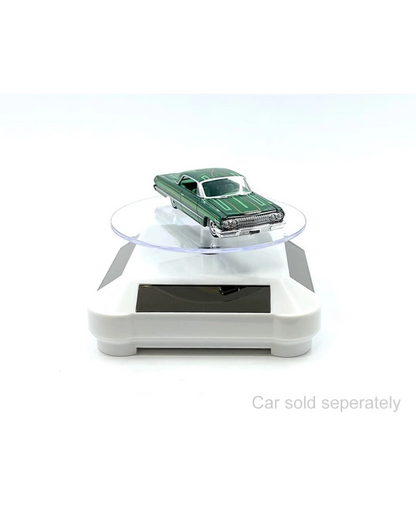 More Than Diecast white solar powered 3.5" turntable display stand with 360 rotation, showcasing a green die-cast car.