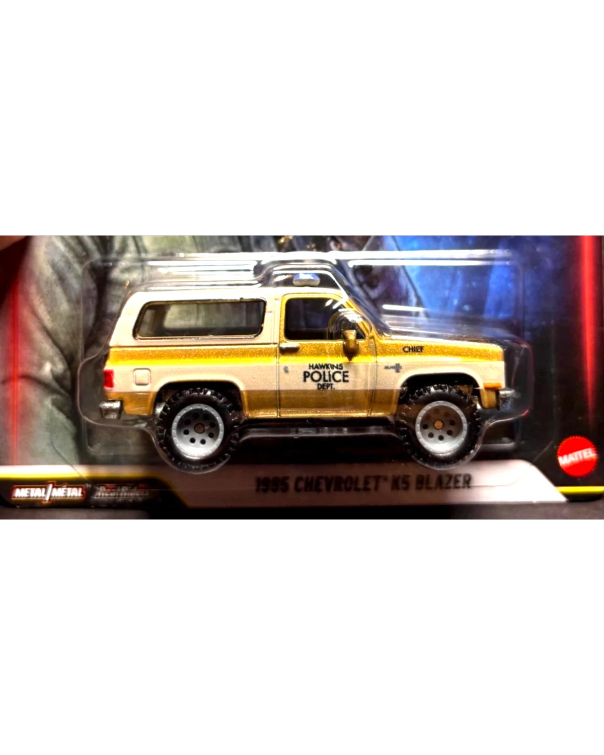 More Than Diecast Hot Wheels Premium Stranger Things 1985 Chevy K5 Blazer in white and gold with Hawkins Police livery