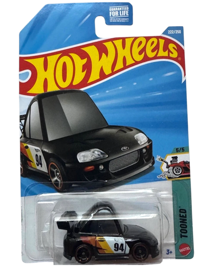 More Than Diecast Hot Wheels Tooned '94 Toyota Supra die-cast car in black with racing decals on blister card