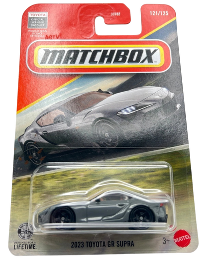 More Than Diecast 2023 Toyota GR Supra in grey, 1:64 scale Matchbox die-cast car in original blister packaging.