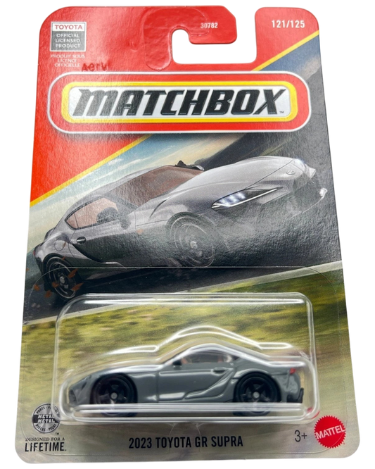 More Than Diecast 2023 Toyota GR Supra in grey, 1:64 scale Matchbox die-cast car in original blister packaging.
