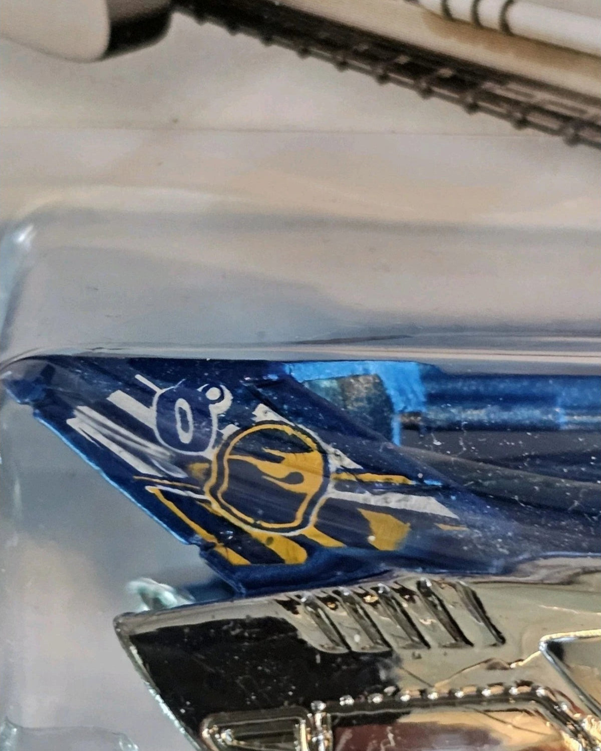 More Than Diecast Hot Wheels Tread Air Treasure Hunt truck featuring blue and white paint with flame graphics