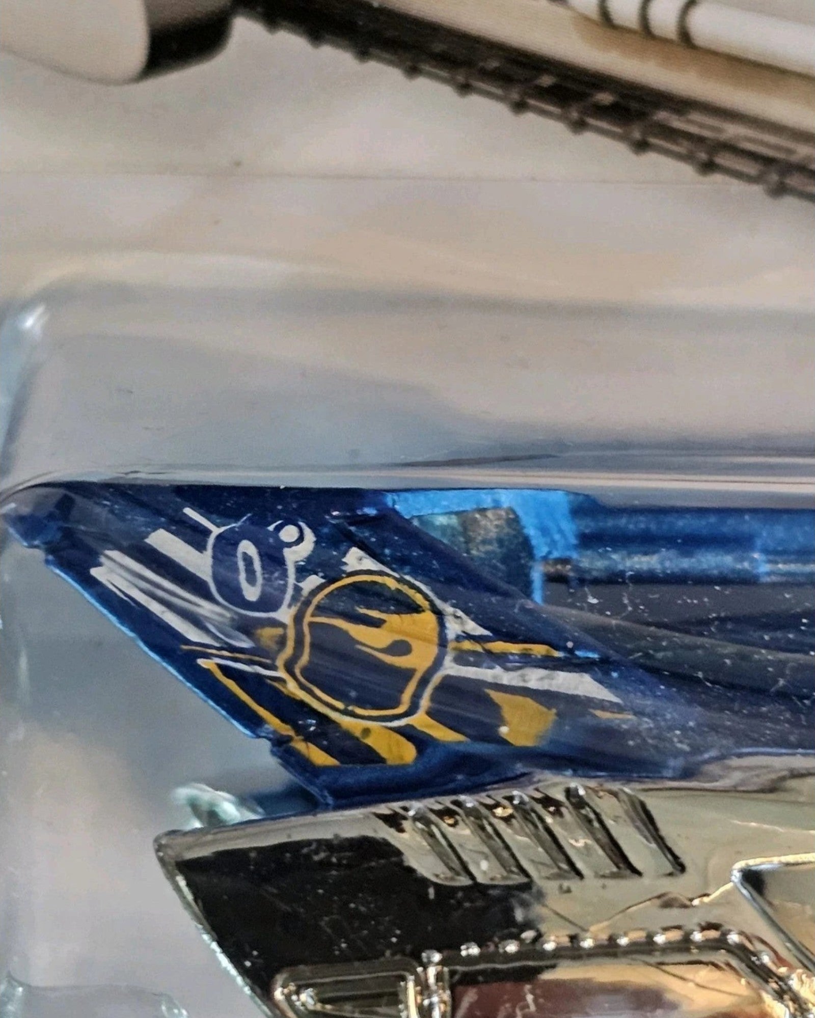 More Than Diecast Hot Wheels Tread Air Treasure Hunt truck featuring blue and white paint with flame graphics