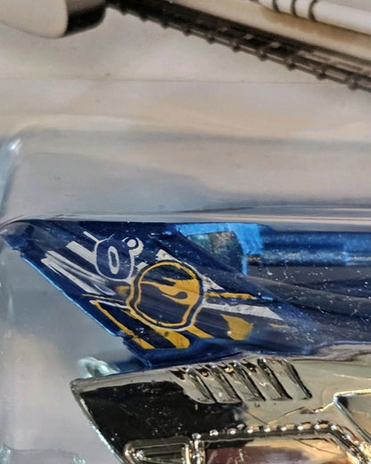 More Than Diecast Hot Wheels Tread Air Treasure Hunt truck featuring blue and white paint with flame graphics