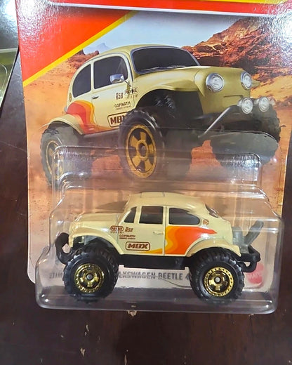 More Than Diecast 2026 Matchbox Volkswagen Beetle 4x4 diecast car in tan with off-road tires and racing decals