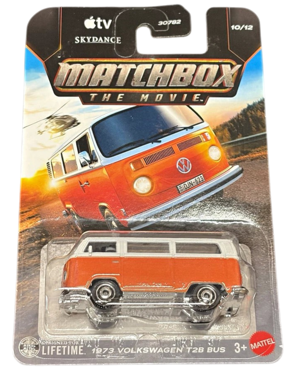 More Than Diecast Matchbox 1973 Volkswagen T2B Bus in orange and white, 1:64 scale die-cast model in blister pack.