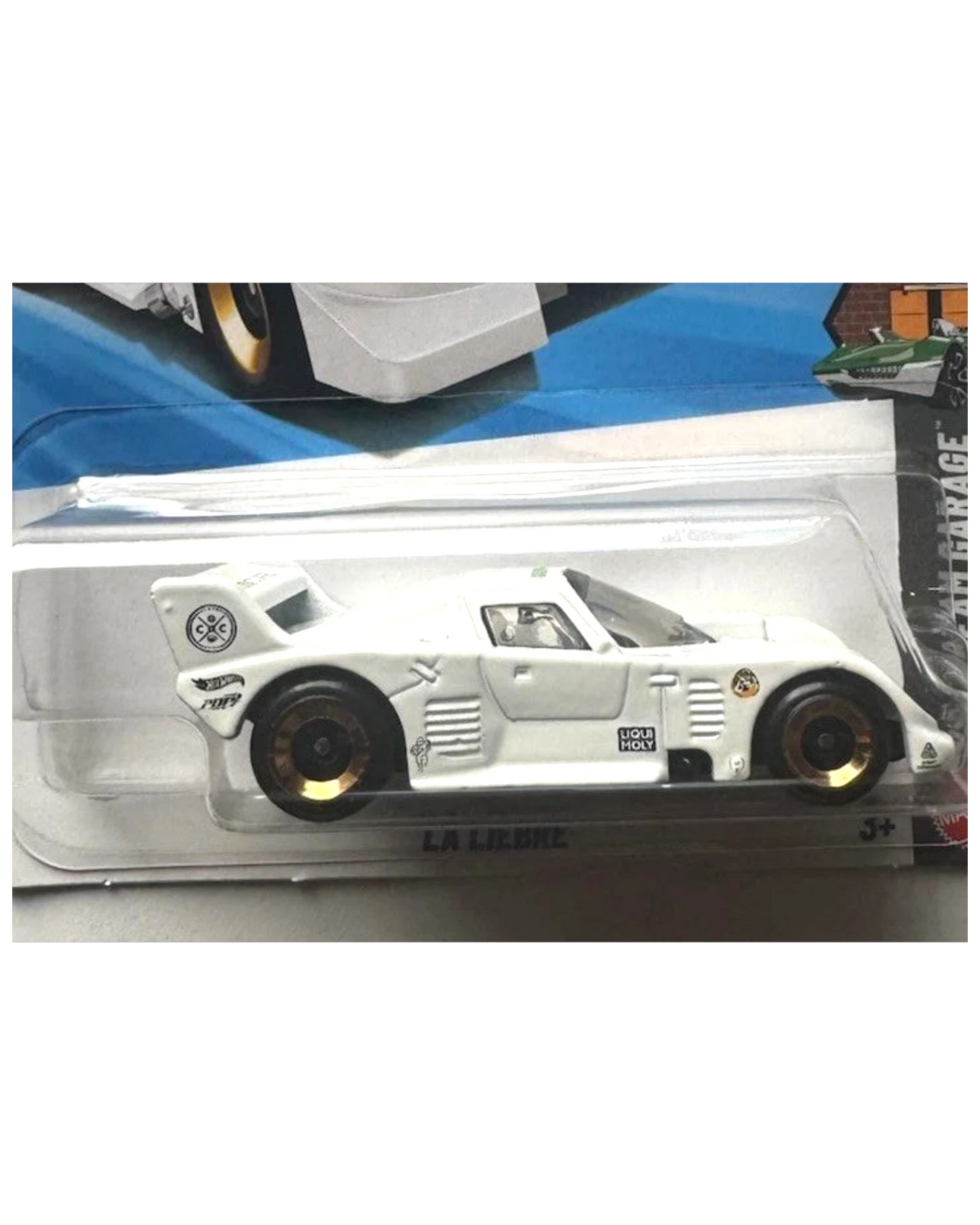 More Than Diecast white La Liebre Hot Wheels toy car with gold rims and "LIQUI MOLY" branding.