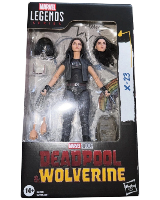 More Than Diecast Marvel Legends Deadpool & Wolverine X-23 action figure in box with accessories and alternate head