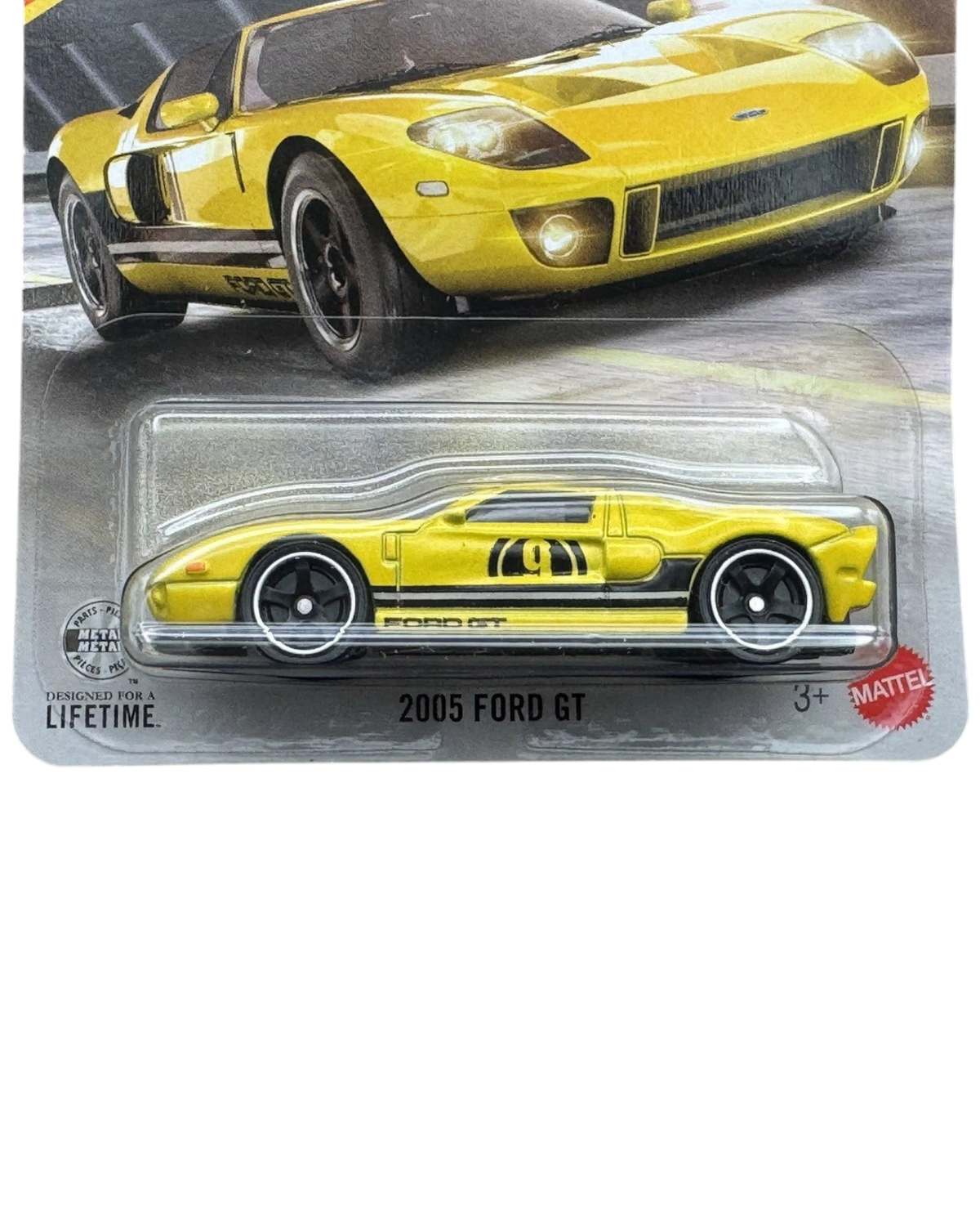 More Than Diecast 1:64 scale yellow 2005 Ford GT die-cast car in original blister pack packaging