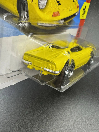 More Than Diecast yellow Hot Wheels Dino 206 GT Ferrari die-cast sports car in short card packaging