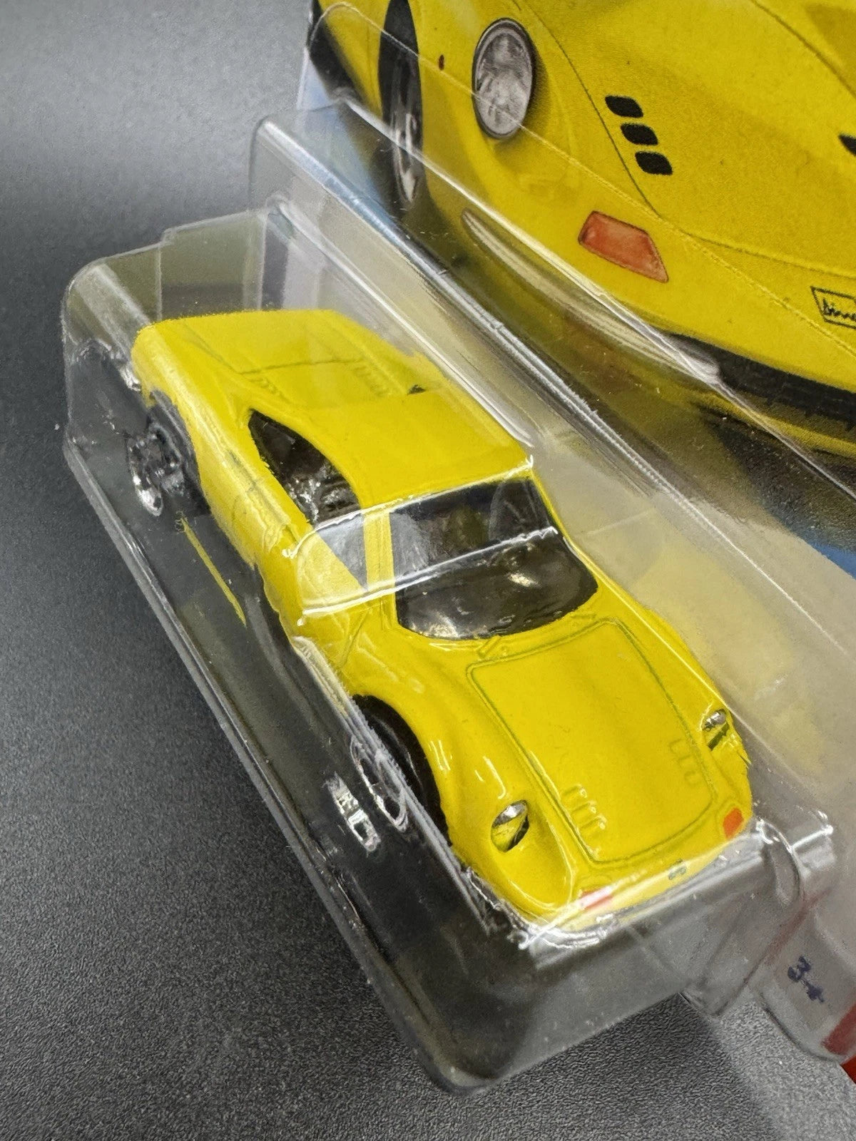 More Than Diecast yellow Hot Wheels Dino 206 GT Ferrari sports car in short card packaging