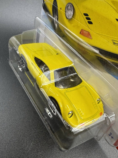 More Than Diecast yellow Hot Wheels Dino 206 GT Ferrari sports car in short card packaging