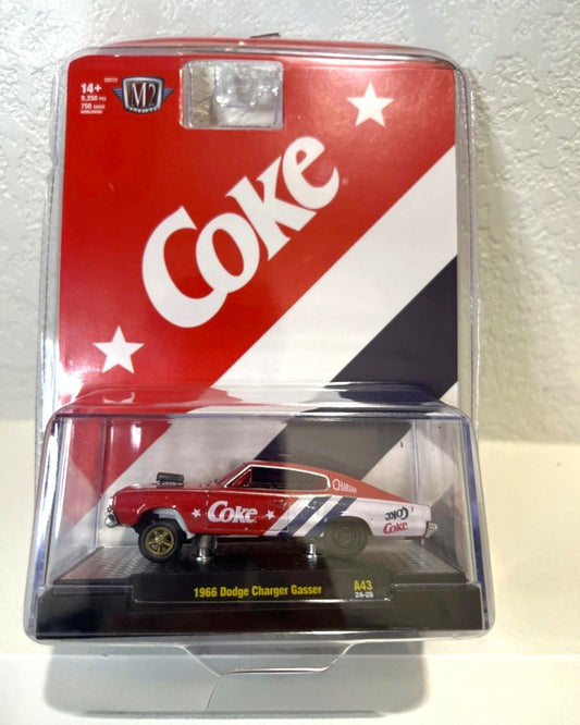 More Than Diecast M2 Machines 1966 Dodge Charger Gasser Coca-Cola edition. Red diecast car with white Coca-Cola graphics and blue stripes.