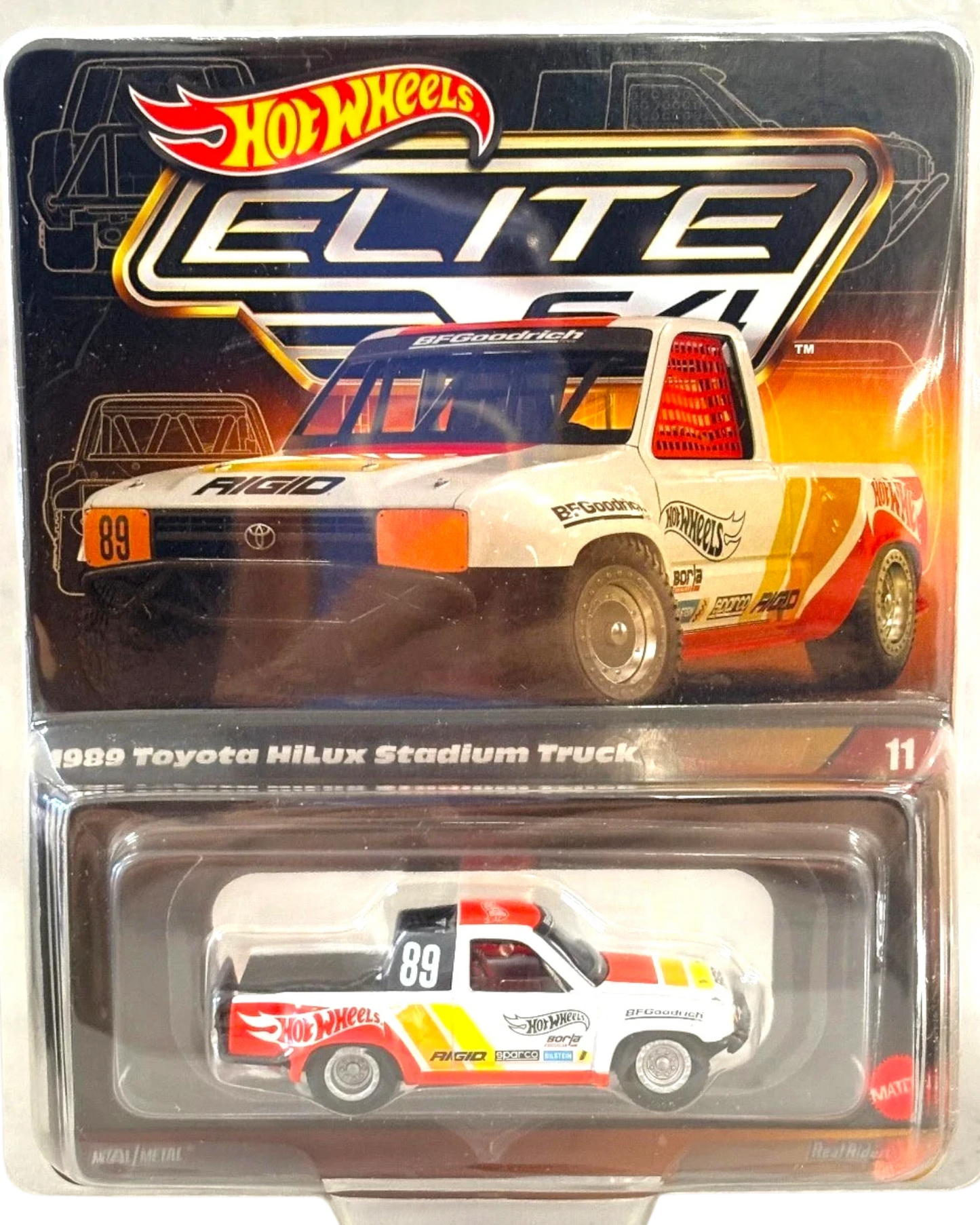More Than Diecast 1:64 scale 1989 Toyota Hilux Stadium Truck, white with red, orange, and yellow racing stripes, BFGoodrich livery.