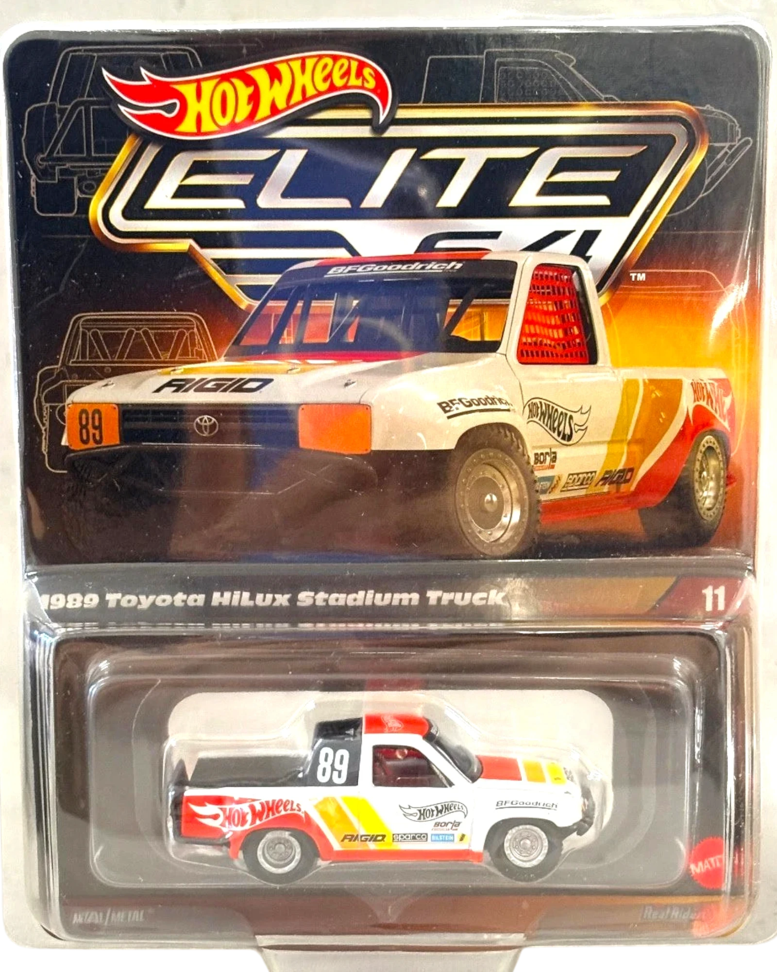 More Than Diecast 1:64 scale 1989 Toyota Hilux Stadium Truck, white with red, orange, and yellow racing stripes, BFGoodrich livery.