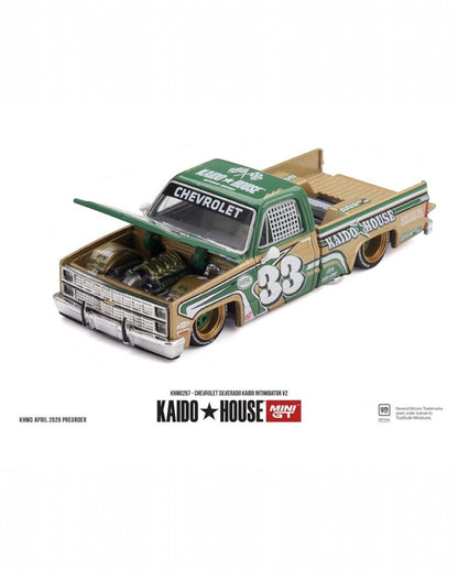 More Than Diecast: 1:64 scale beige Chevrolet Silverado Kaido Intimidator V2 die-cast model with green accents and racing number 33.