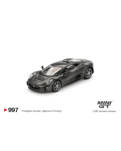 More Than Diecast 1:64 scale black Mini GT Jaguar C-X75 test car die-cast model with carbon fiber finish.