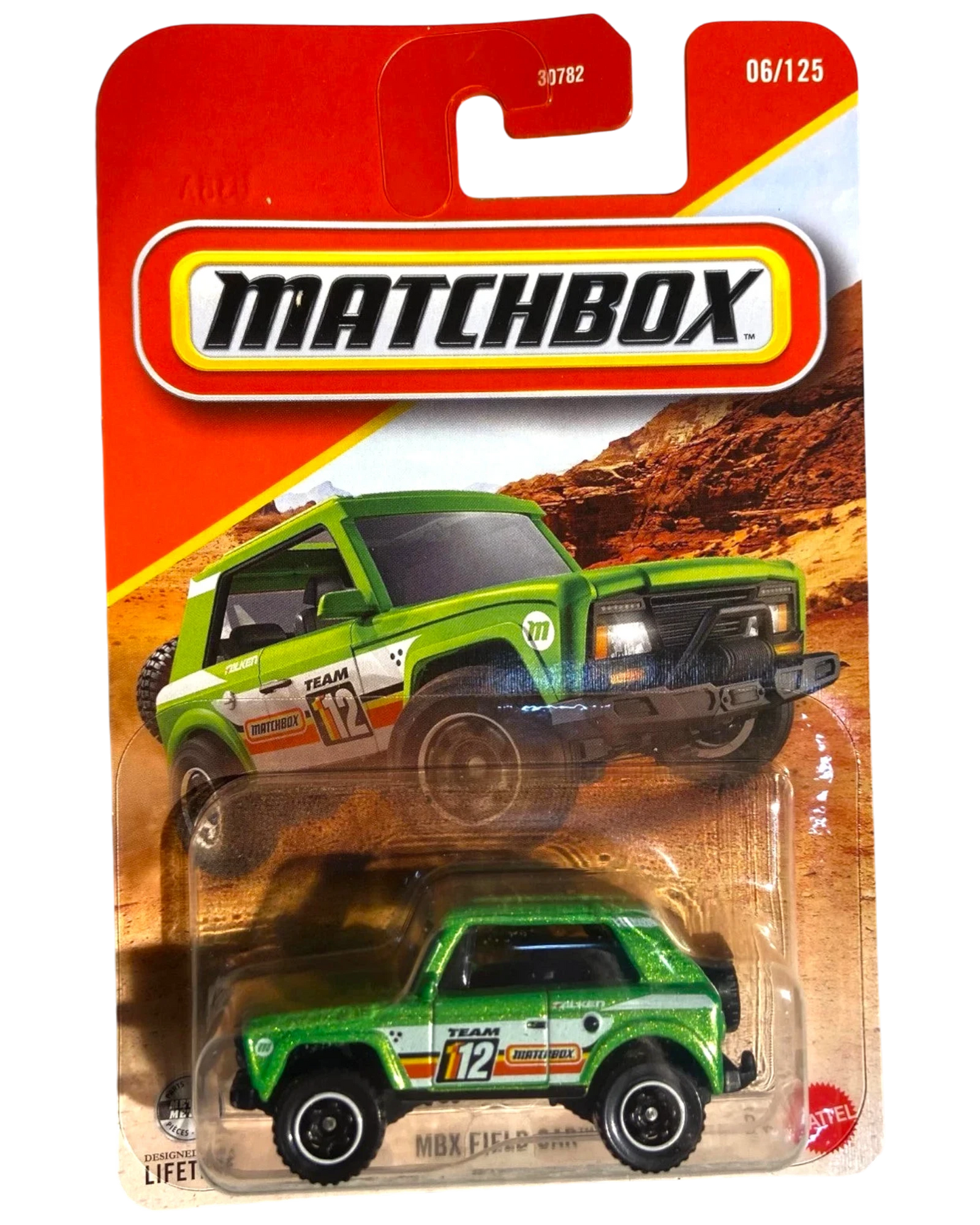 More Than Diecast green 1:64 scale Matchbox MBX Field Car #6 die-cast utility vehicle with white and orange racing stripes.