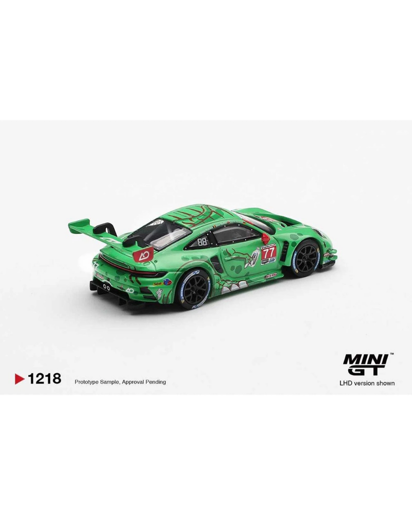 More Than Diecast: Green 1:64 scale AO Racing Porsche 911 GT3 R 992 model car with #77 livery.