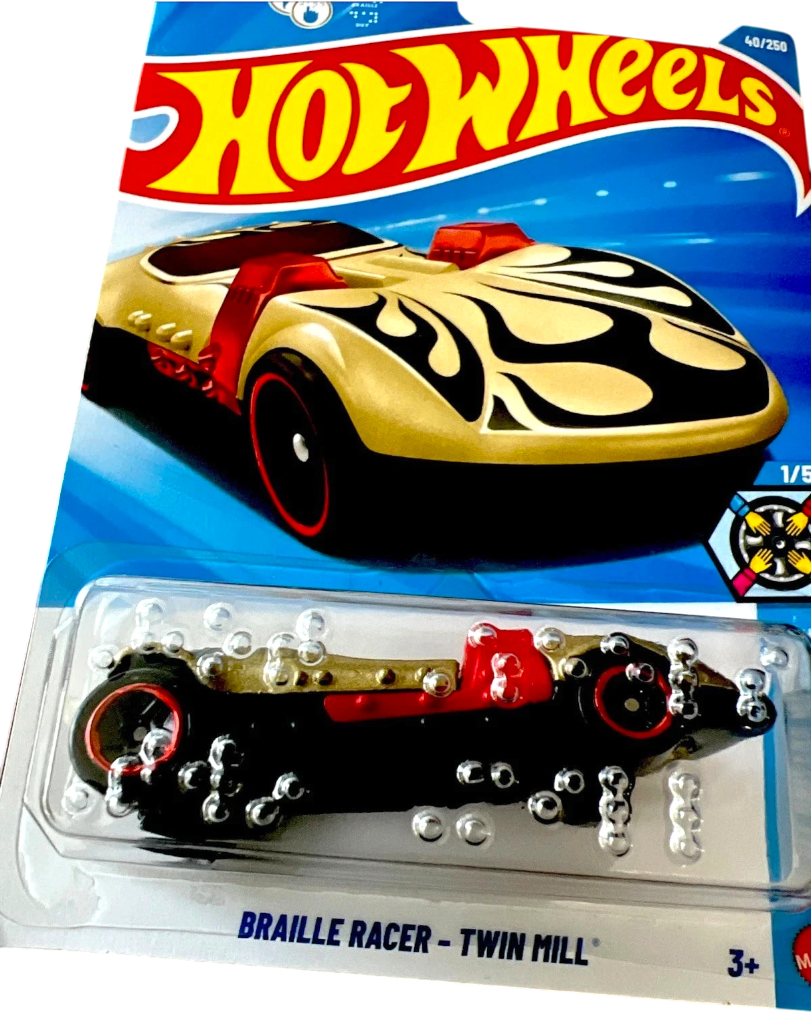 More Than Diecast Hot Wheels Braille Racer Twin Mill 40/250 die-cast car with gold flames on black body, red accents, and chrome veneer.