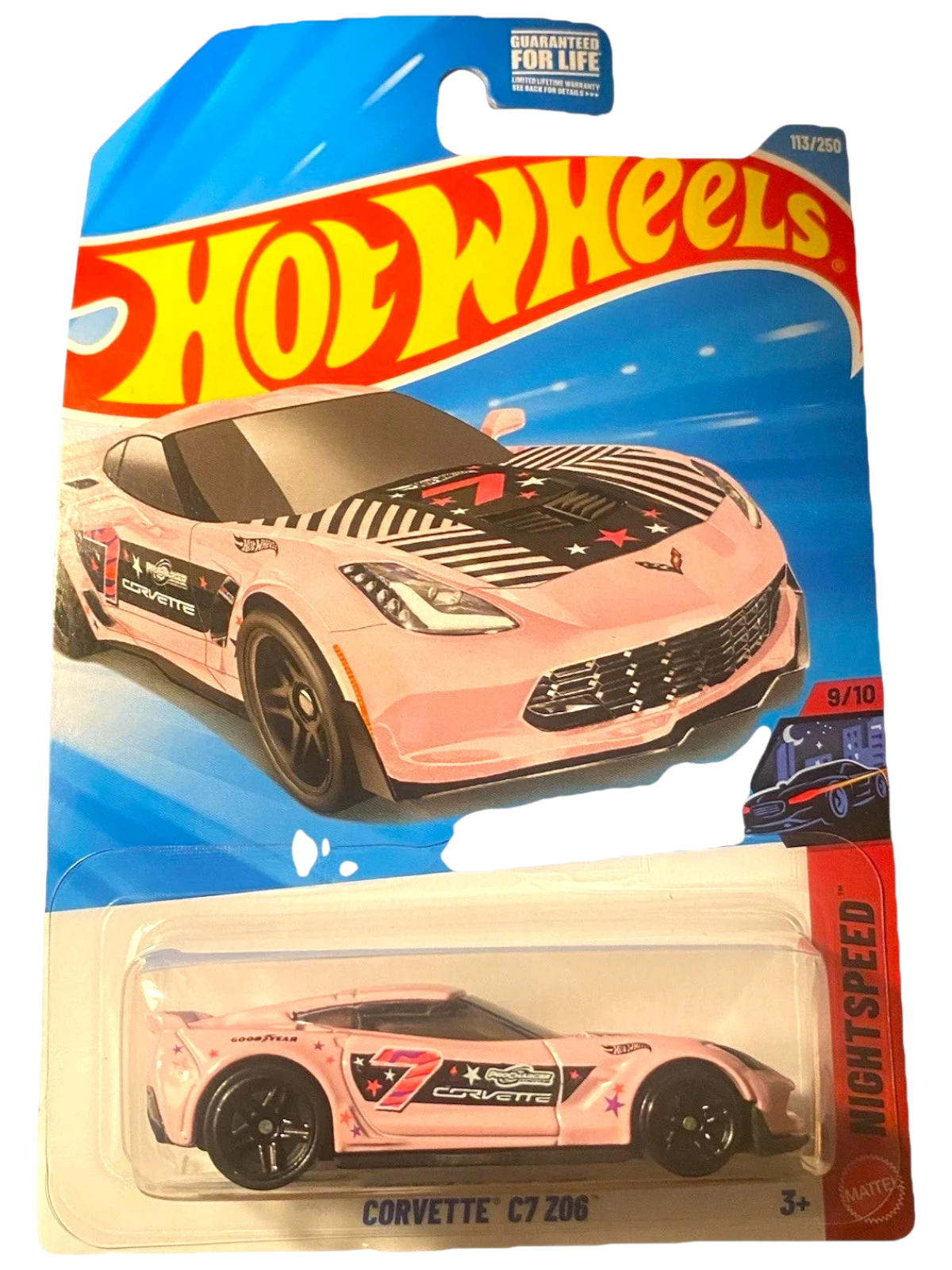 More Than Diecast Hot Wheels Corvette C7 Z06 in pink with black and white racing stripes and star graphics. 1:64 scale die-cast.