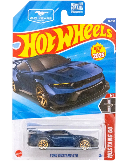 More Than Diecast Hot Wheels Ford Mustang GTD toy car, dark blue with gold wheels and spoiler.