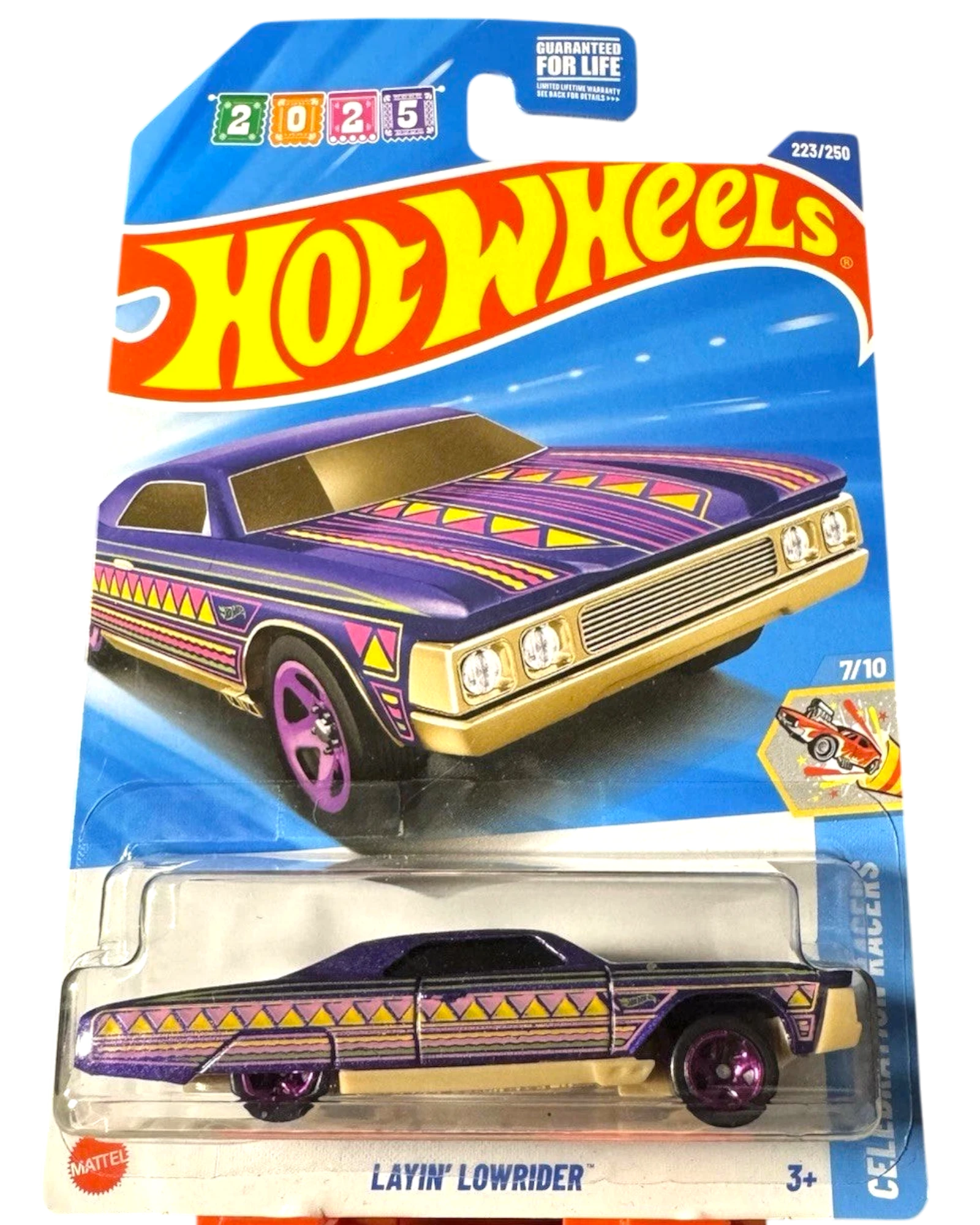 More Than Diecast 2025 Hot Wheels Layin Lowrider, purple die-cast car with gold accents and geometric patterns. Celebration Racers series.