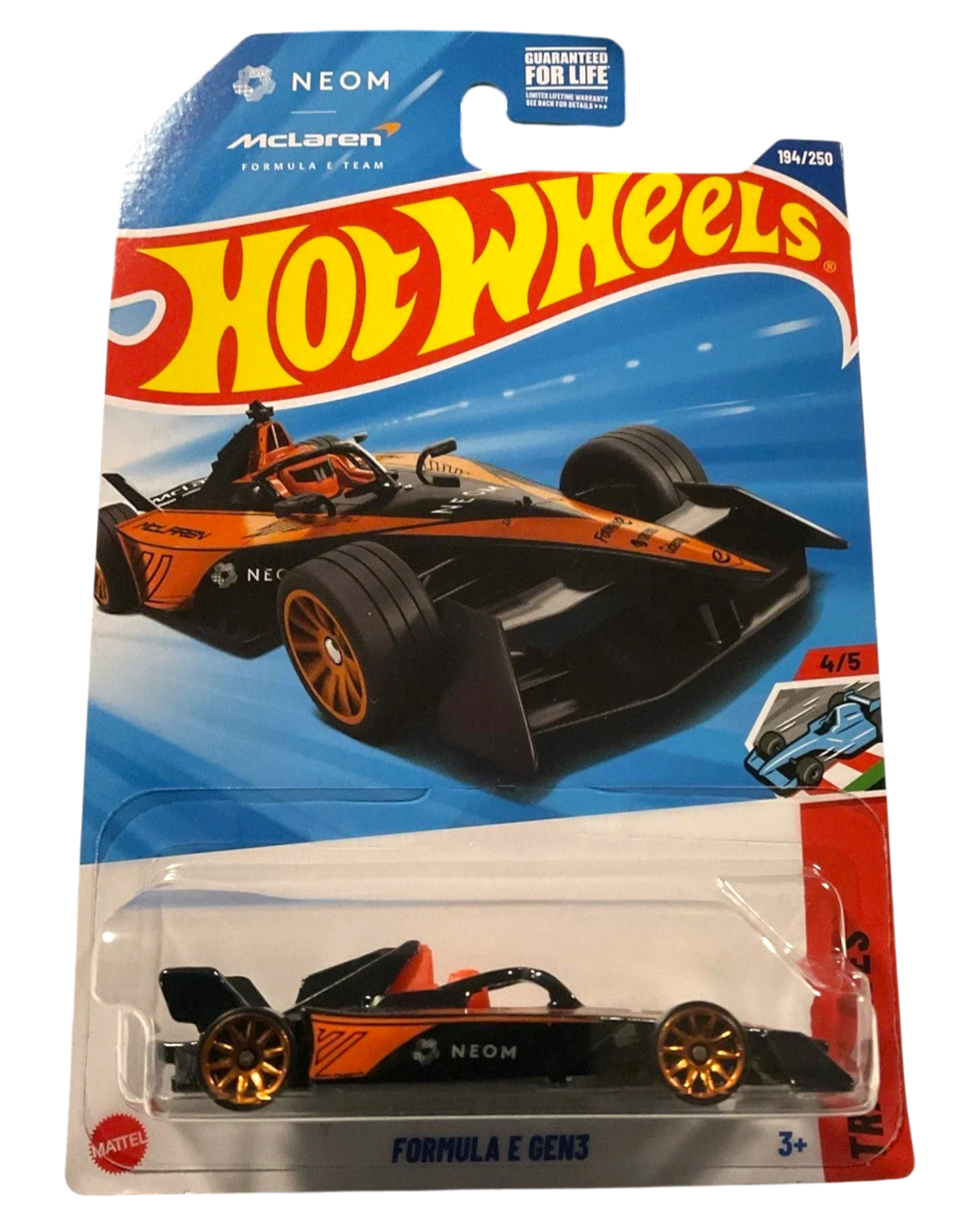 More Than Diecast 2025 Hot Wheels Neom McLaren Formula E GEN3 die-cast car, black with orange accents and gold wheels.