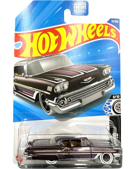 More Than Diecast Hot Wheels 58 Chevy Impala in purple, 1:64 scale die-cast with chrome accents and white wall tires.