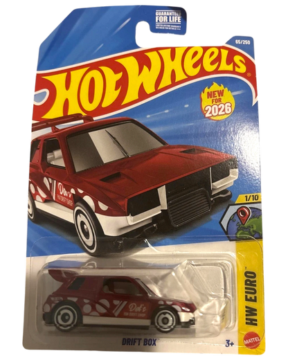 More Than Diecast Hot Wheels red Drift Box toy car with white polka dot graphics and a spoiler, packaged for display.