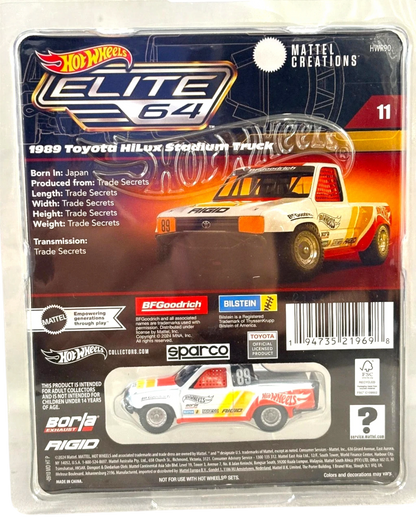 More Than Diecast: Hot Wheels Elite 64 1989 Toyota Hilux Stadium Truck, white with red and yellow racing stripes, die-cast collectible.